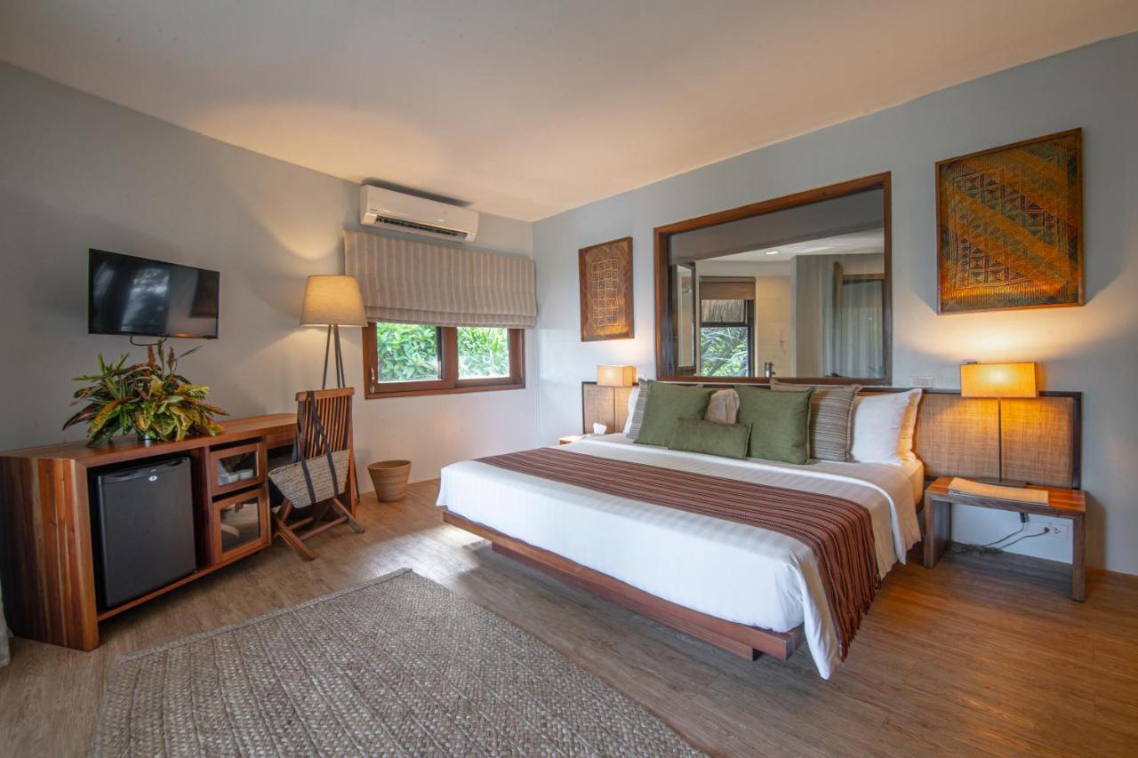 Amun Ini Beach Resort & Spa Anda  Esterno foto