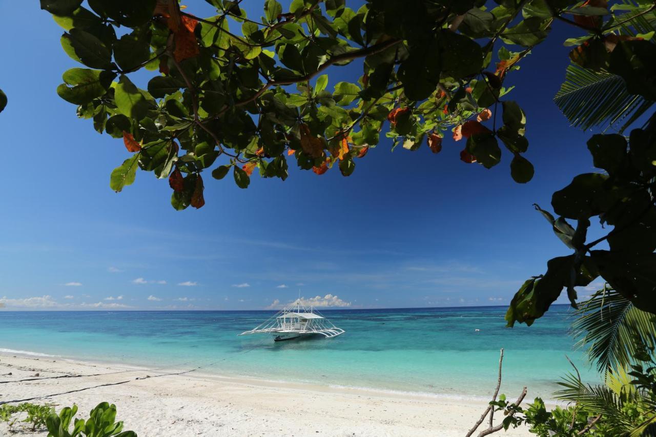 Amun Ini Beach Resort & Spa Anda  Esterno foto