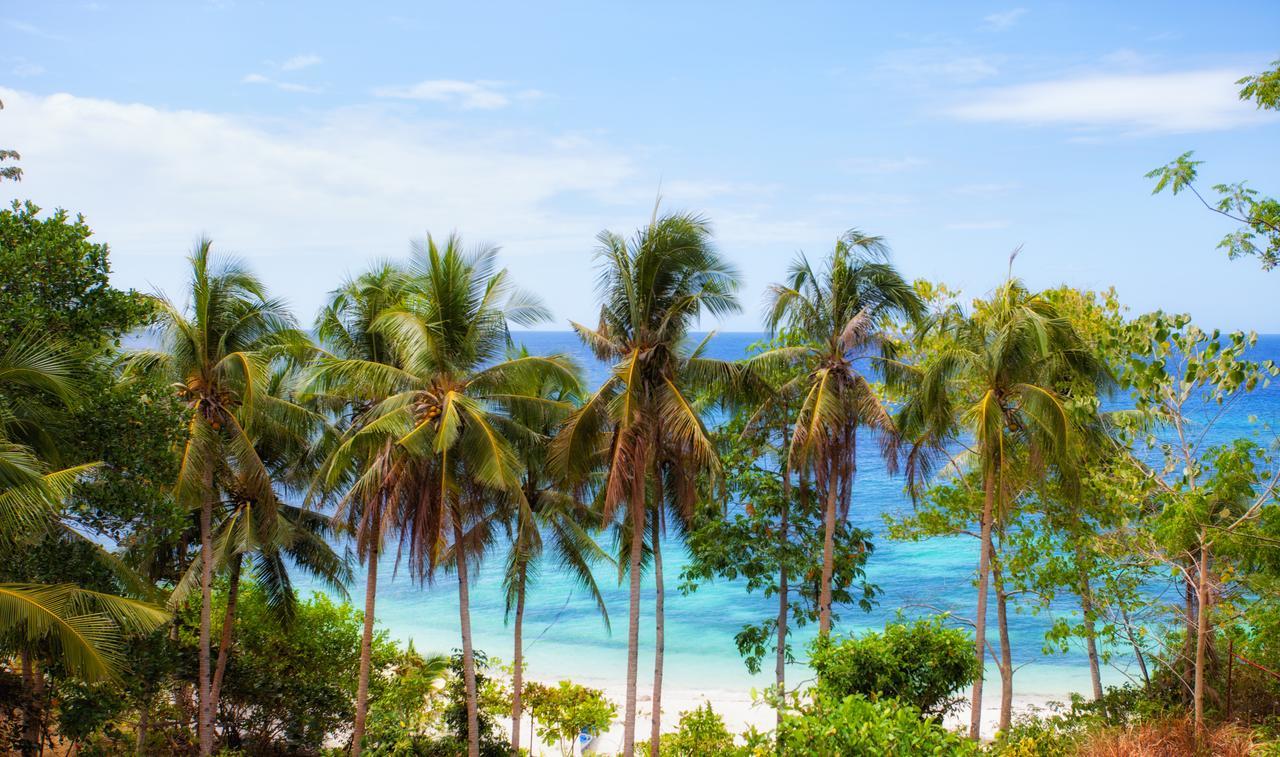 Amun Ini Beach Resort & Spa Anda  Esterno foto